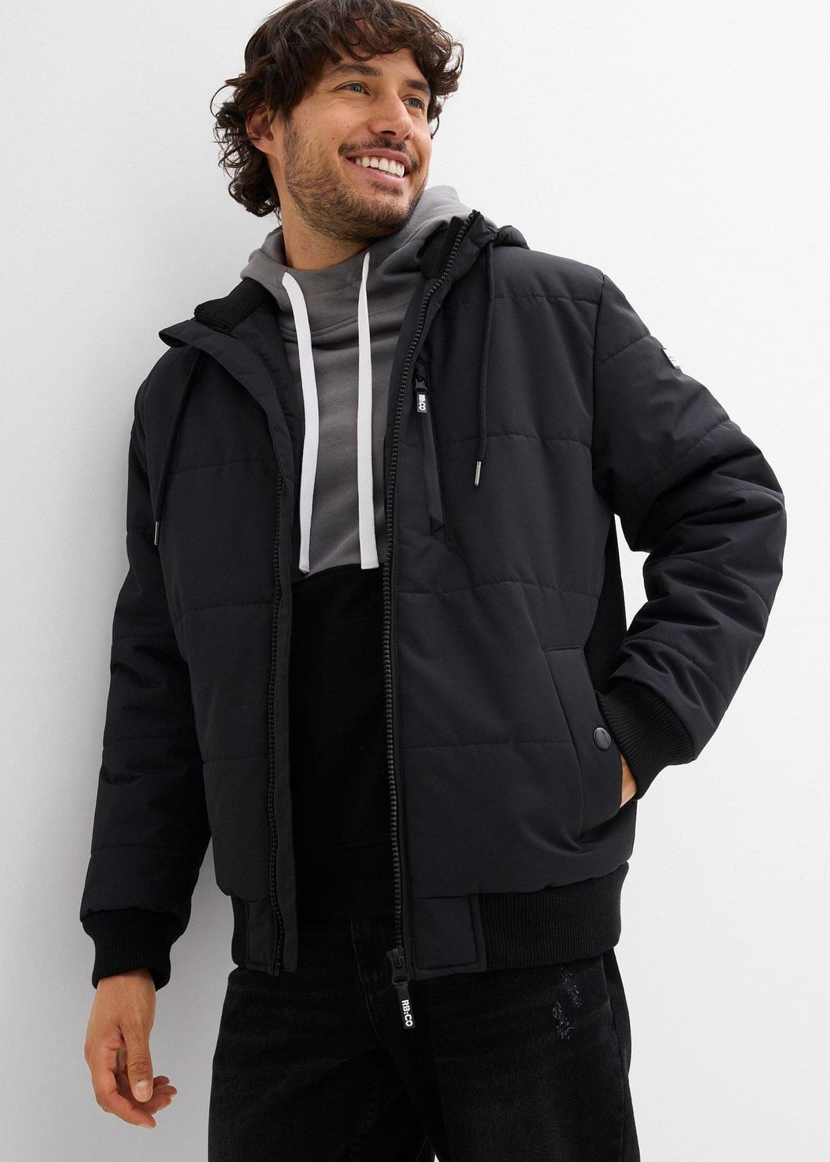 bonprix Winter-Steppjacke in Blousonform mit Kapuze, schwarz, Gr.64, Gesteppter Winterblouson mit Kapuze