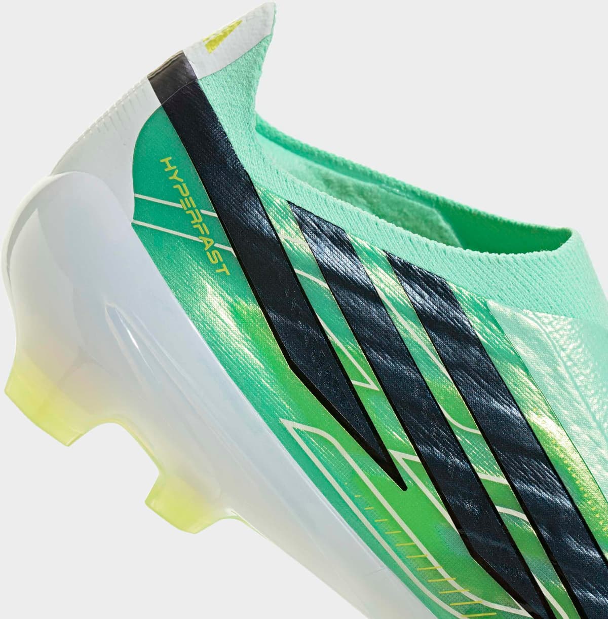 Fussballschuh ADIDAS PERFORMANCE "F50 HYPERFAST PRO, FESTE BÖDEN, OHNE SCHNÜRSENKEL", Gr. 48, grün (pulse mint, core schwarz, solar lemon), Synthetik, Textil, Schuhe Fussballschuh, Aussensohle für Rasen und feste Böden pulse mint, core schwarz, solar lemo